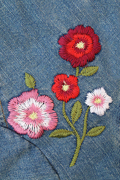 lass blume auf jeans - embroider stock-fotos und bilder