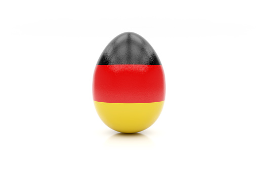 easter egg painted with the flag of Germany on white background, isolated