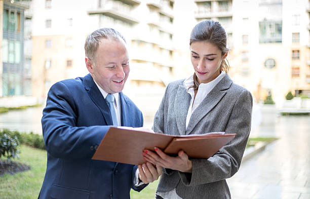 istock Two business people discussing outside the office 467874640