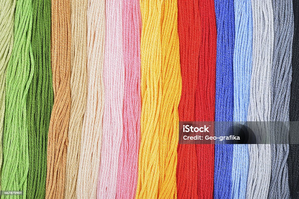 Colorful embroidery threads. Colorful embroidery threads in a row. Colorful background. Art And Craft Stock Photo