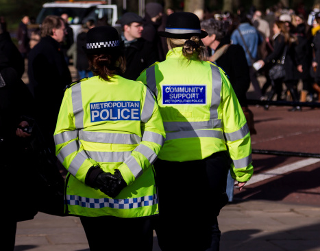 London UK, 2nd Feb 2014: Metropolitan Police Officer with a Community Support Officer outside on the streets of London