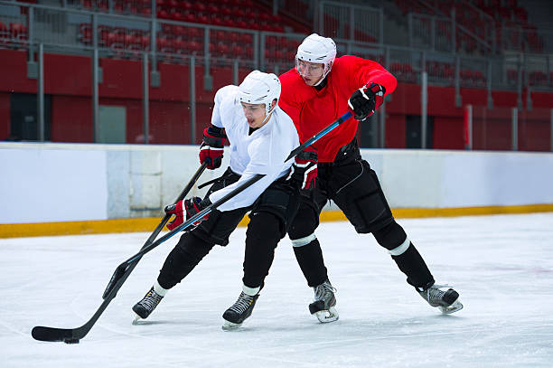 istock Two Ice Hockey Players Duelling 467878815