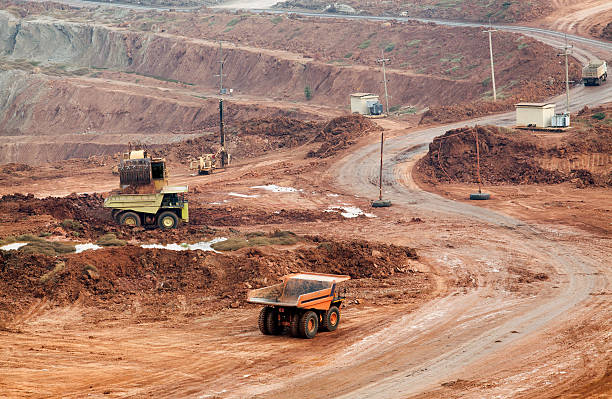 istock Part of a pit with big mining truck working 467879308
