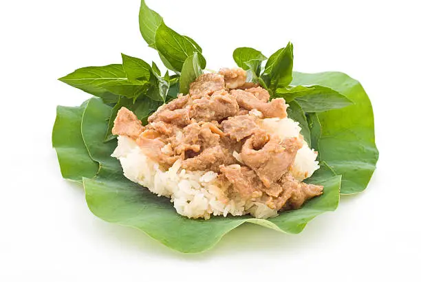 Stirred pork with sticky rice , One of most popular Thai street foods for breakfast.