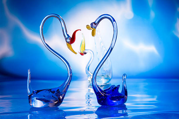 istock crista swans in lake 467879847