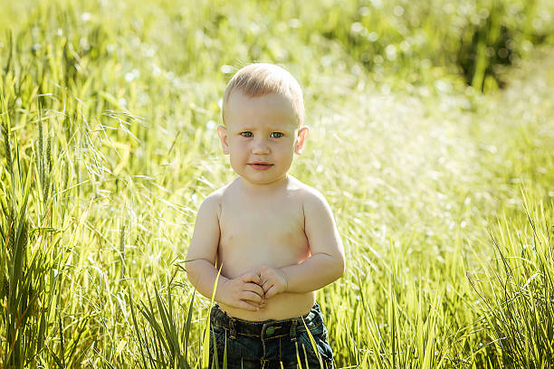 istock little boy on the lawn, 467881680