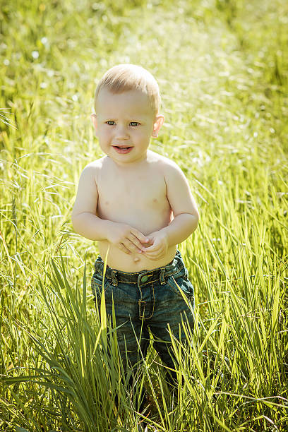 istock little boy on the lawn, 467881686