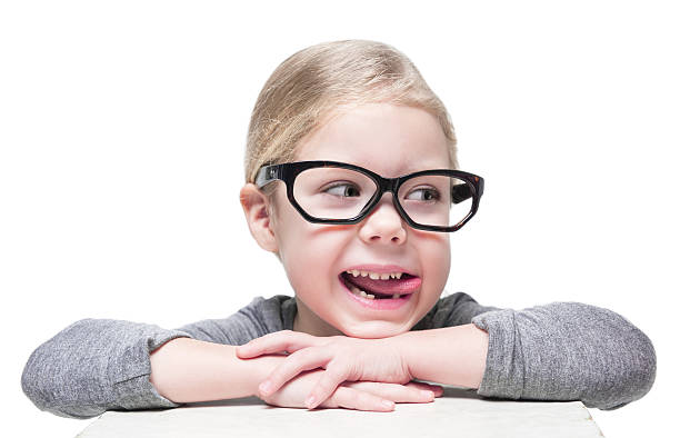 istock Smart cheerful beautiful little girl in glasses 467882700