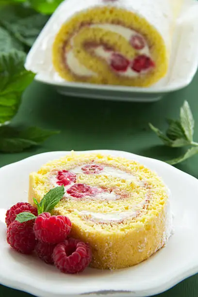 Roulade with raspberries and cream.