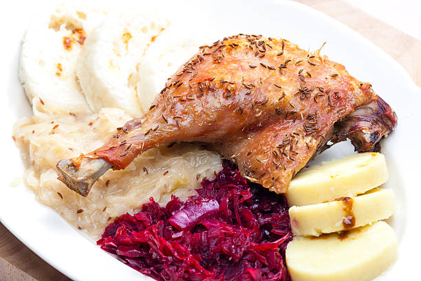 istock baked duck meat with dumlings 467889060