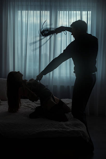 Man Tied Woman And Beats Stock Photo - Download Image Now - Women