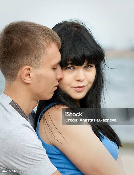 Loving Young Couple Is Embracing Stock Photo - Download Image Now - Adult, Affectionate, Beautiful People