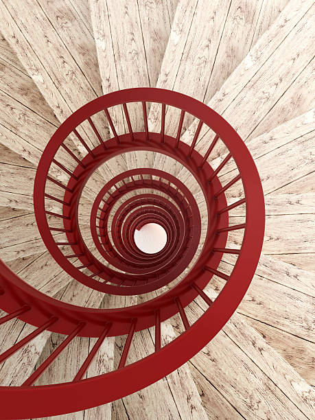 istock Spiral stairs with red balustrade 467894126