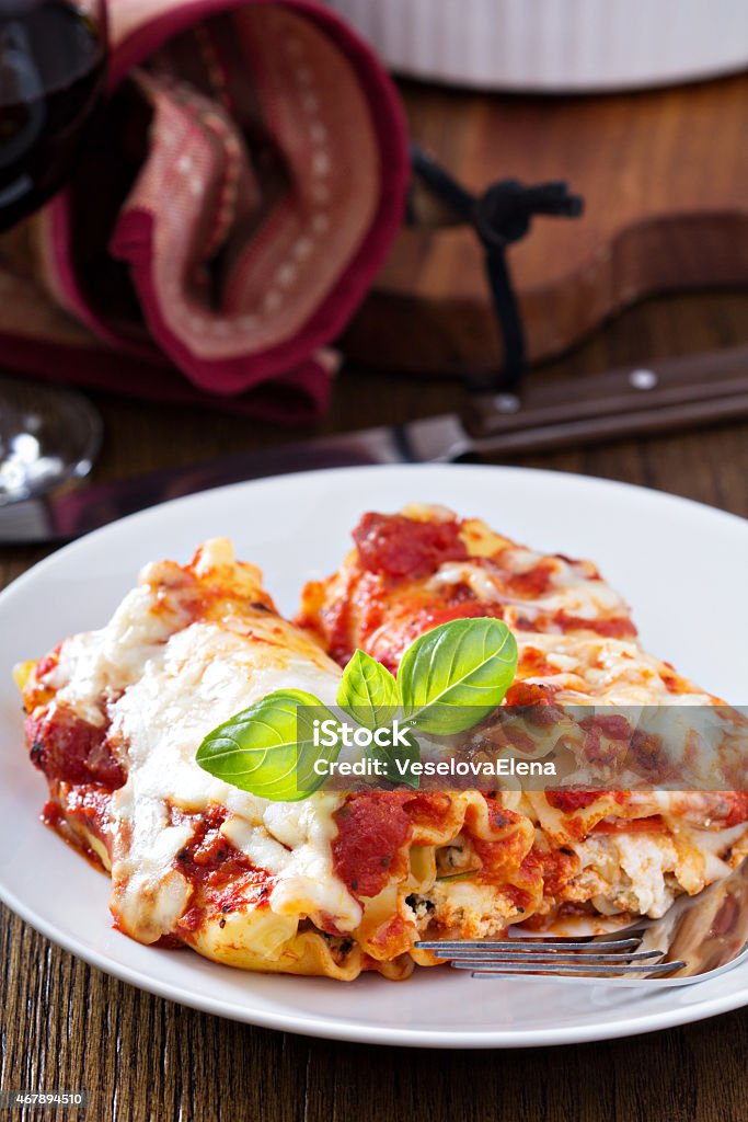 Lasagna rolls with tomato sauce Lasagna rolls with tomato sauce, ricotta and pepperoni Bun - Bread Stock Photo