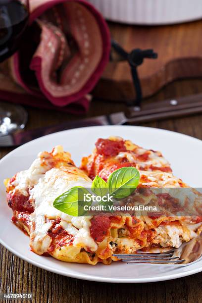 Lasagna Rolls With Tomato Sauce Stock Photo - Download Image Now - Bun - Bread, Lasagna, Rolled Up