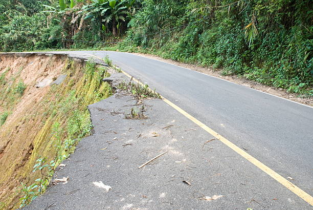 istock Damage road from landslide in Thailand 467894698