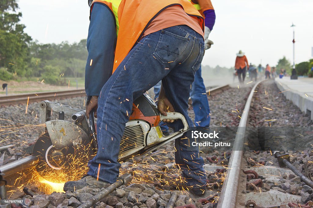 Workers were cutting tracks for maintenance. Railroad Track Stock Photo