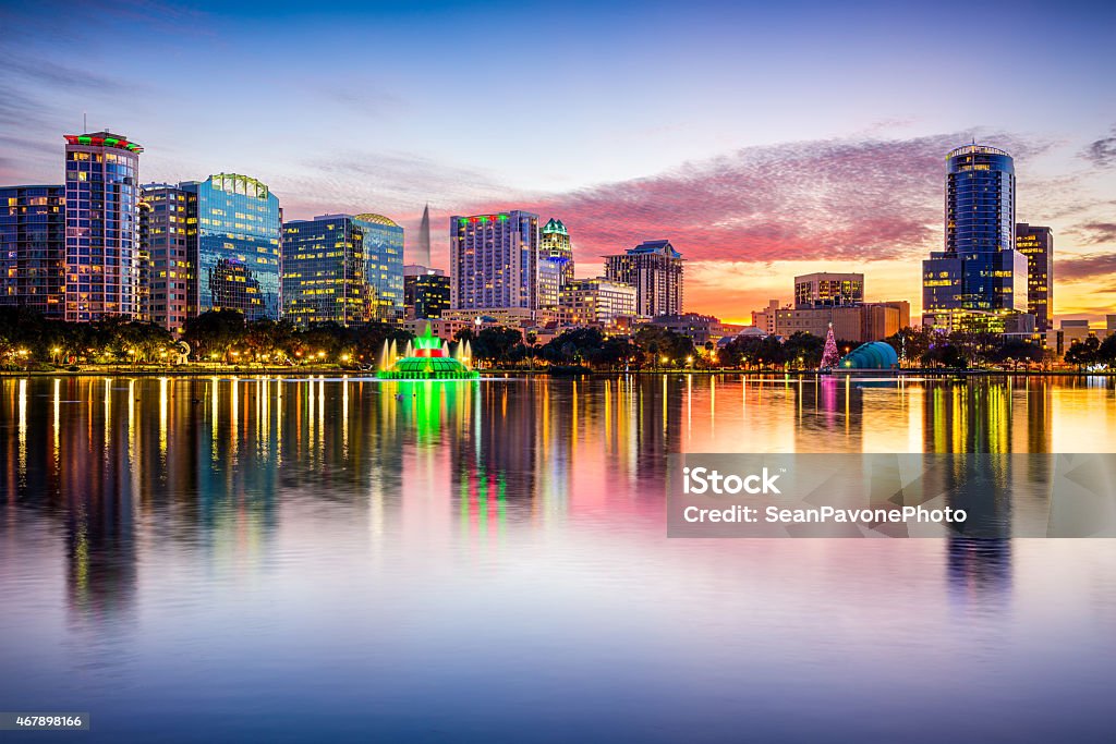 Orlando Florida Skyline in the evening during Summer Orlando, Florida, USA downtown city skyline from Eola Park. Orlando - Florida Stock Photo