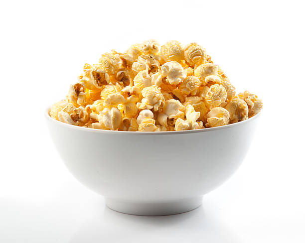 istock Popcorn in a bowl on white background 467901198
