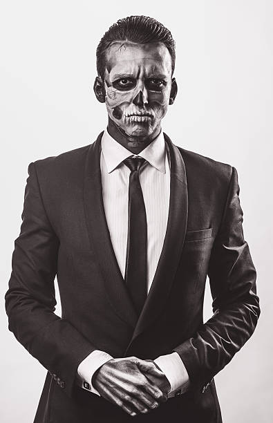 istock discolored businessman with  make-up  skeleton 467902758