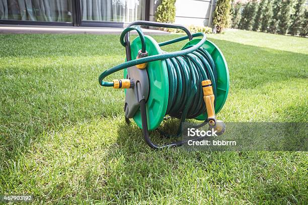 Hose On Garden Stock Photo - Download Image Now - 2015, Agriculture, Copy Space