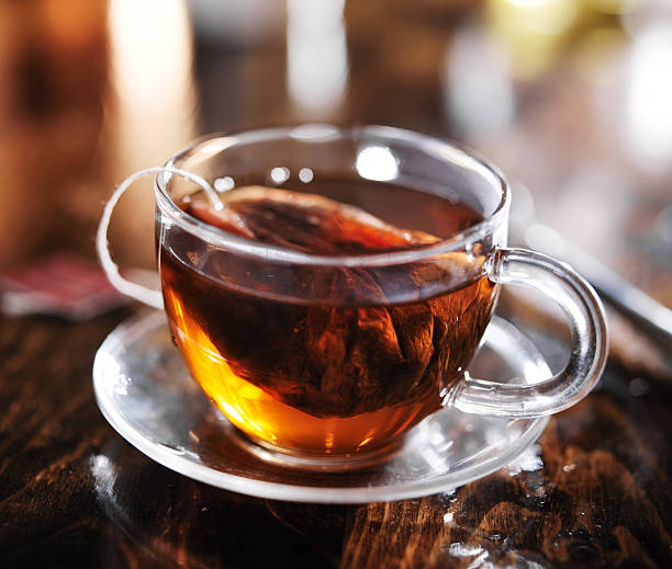 istock hot cup of tea steeping in glass 467903482