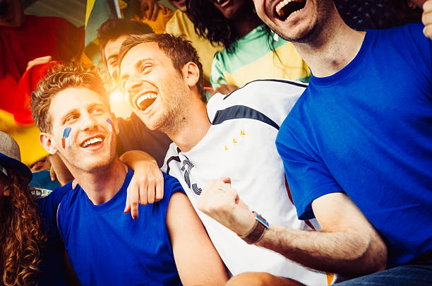 istock Fans of different nations at the stadium together 467903849
