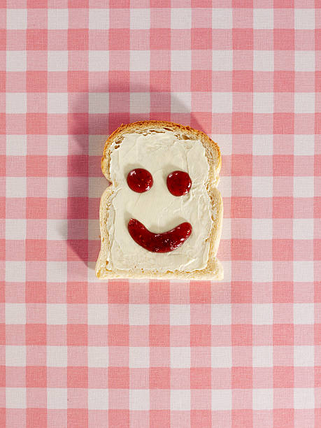 счастливый хлеб - butter toast bread breakfast стоковые фото и изображения