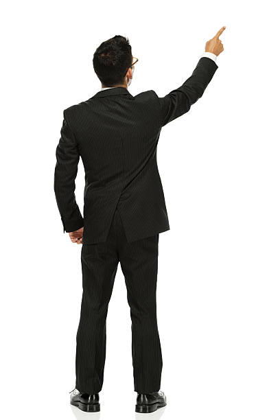 istock Rear view of businessman pointing 467905791
