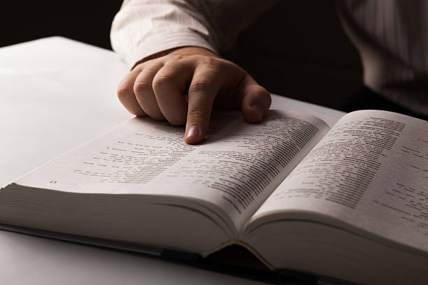 istock man is looking for information in the directory 467906593