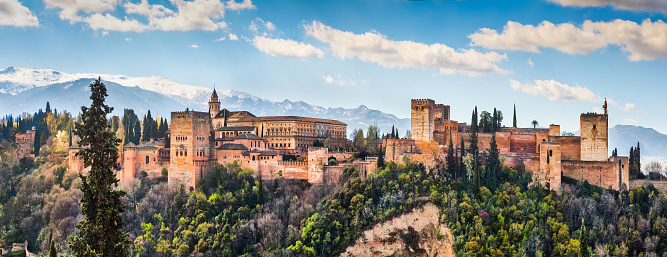 View of the grounds of the Alhambra of Granada, from where you can enjoy a beautiful view of the city. The palace is the most famous landmark of Granada and a monument of the Islamic architecture in the world.