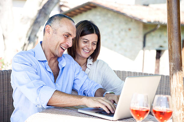 istock Adult couple surfing the net on computer 467906947
