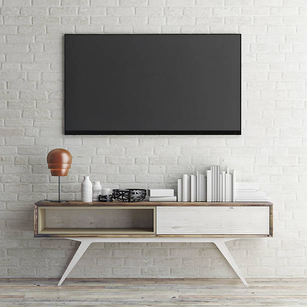 モックテレビを、ホワイトのレンガの壁、3 d illustration - television flat screen plasma high definition television ストックフォトと画像