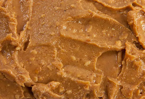 Picture of a spreaded heap of peanut butter