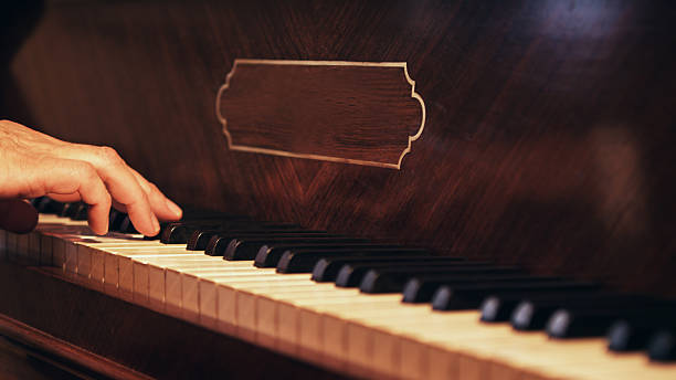 istock Man Playing Luxurious, Old Piano in Florence, Italy 467912146