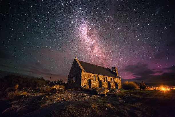 The Church of the Good Shepherd on the shores of Lake Tekapo and the town of the same name on the South Island of New Zealand.