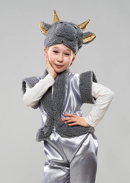 istock red-haired girl in a cow costume 467913170