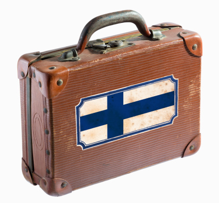 Antique leather suitcase with flag of Finland