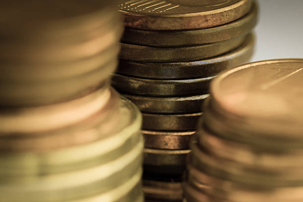 istock Gold money background with stack of coins, macro. 467915878
