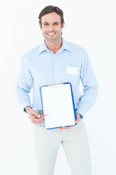 istock Happy businessman showing blank clipboard 467916828