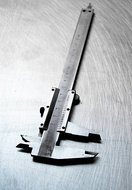 istock Calliper on the scratched metal background 467919462