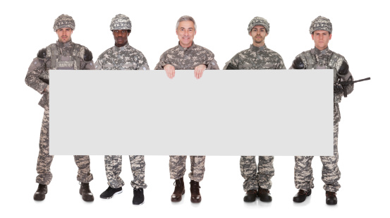 Group Of Soldier With Blank Placard Over White Background