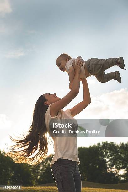 Mother With Baby Outdoors Stock Photo - Download Image Now - 12-17 Months, Activity, Adult