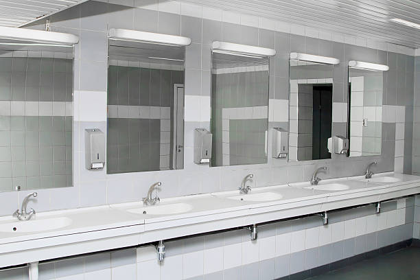 An interior of a private restroom with mirrors interior of private restroom public restroom stock pictures, royalty-free photos & images