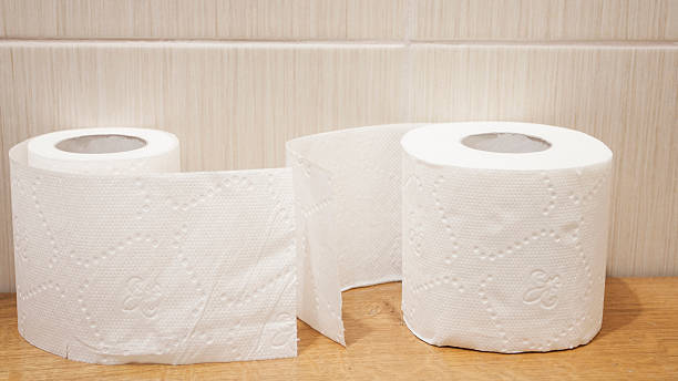 istock The unwound rolls of white toilet paper 467921808