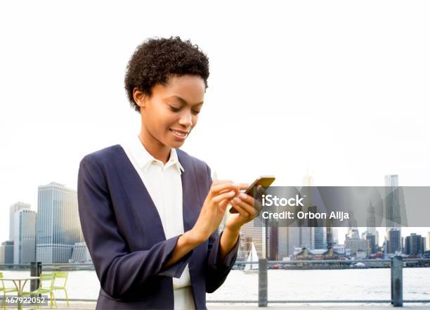 Businesswoman Using Smart Phone In New York Stock Photo - Download Image Now - Businesswoman, New York City, New York State