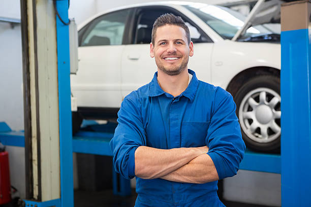 istock Auto mechanic smiling at a job accomplished 467923726