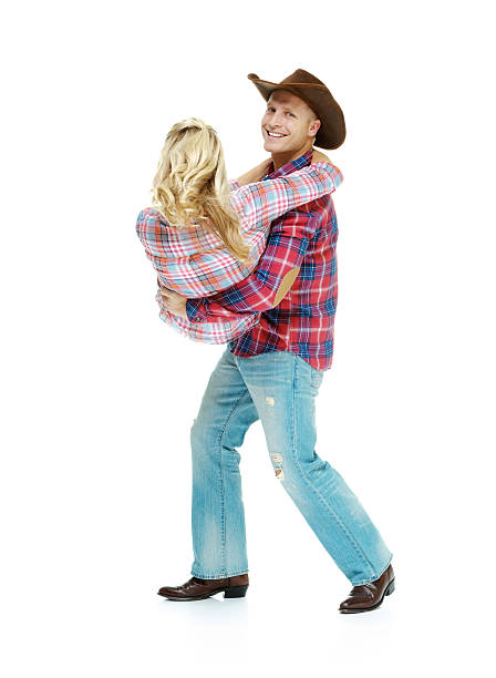 istock Happy cowboy couple dancing 467924399