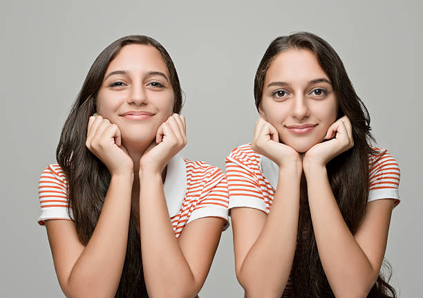 istock Twin teenage sisters 467924443