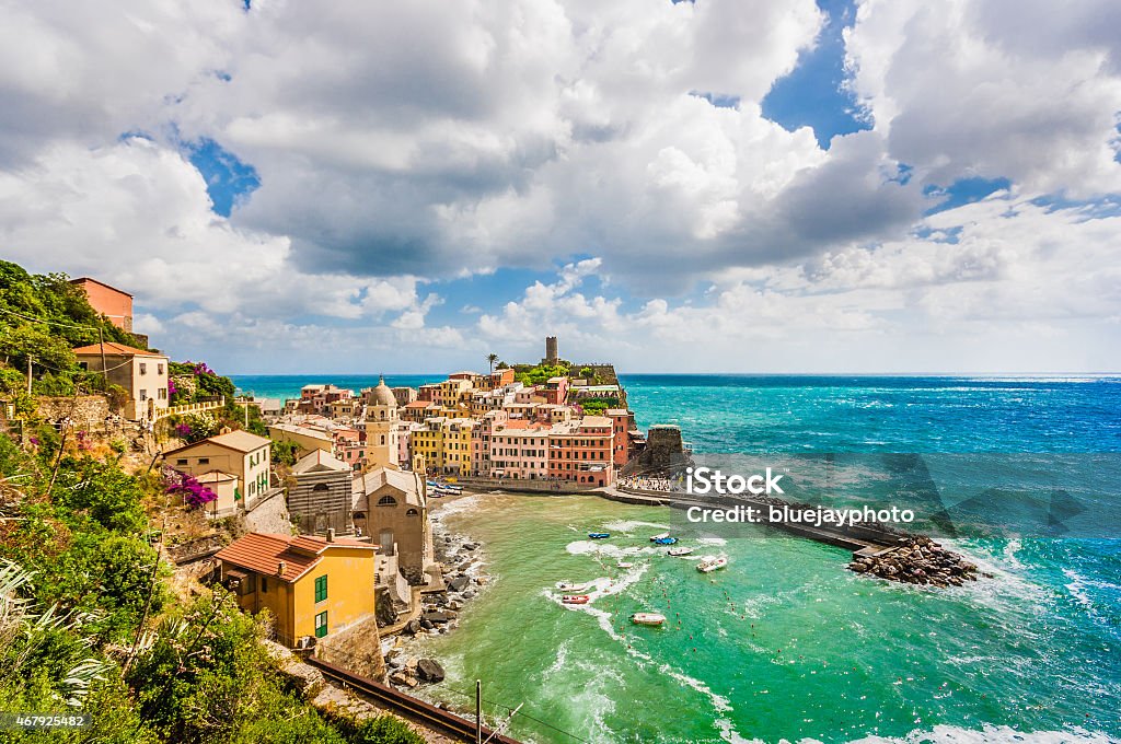 Town of Vernazza, Cinque Terre, Italy Beautiful view of Vernazza, one of the five famous fisherman villages of Cinque Terre with dramatic cloudscape in Liguria, Italy. Cinque Terre Stock Photo